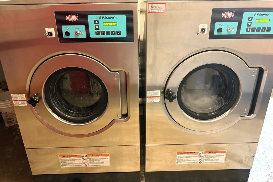 Milnor on-premise washer-extractors installed by Arrow Machinery for a care facility laundry